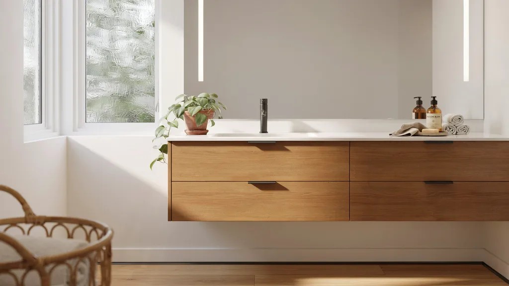 Modern bathroom vanity with sink and storage cabinet in a compact 3/4 bathroom.