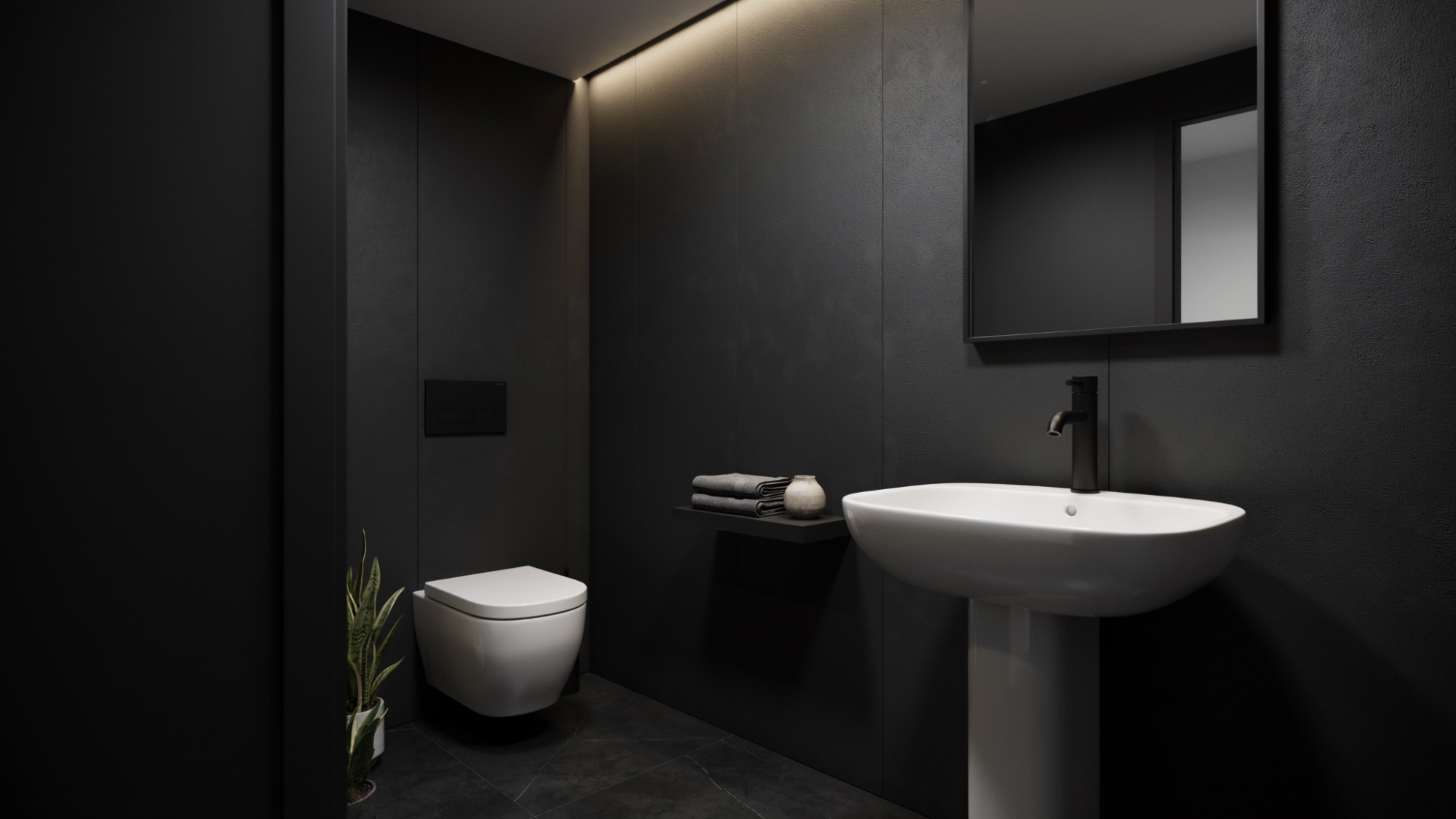 Modern bathroom with matte black walls, white fixtures, and warm lighting.